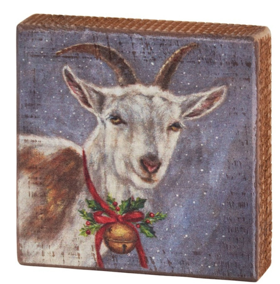 Goat with bell block sign