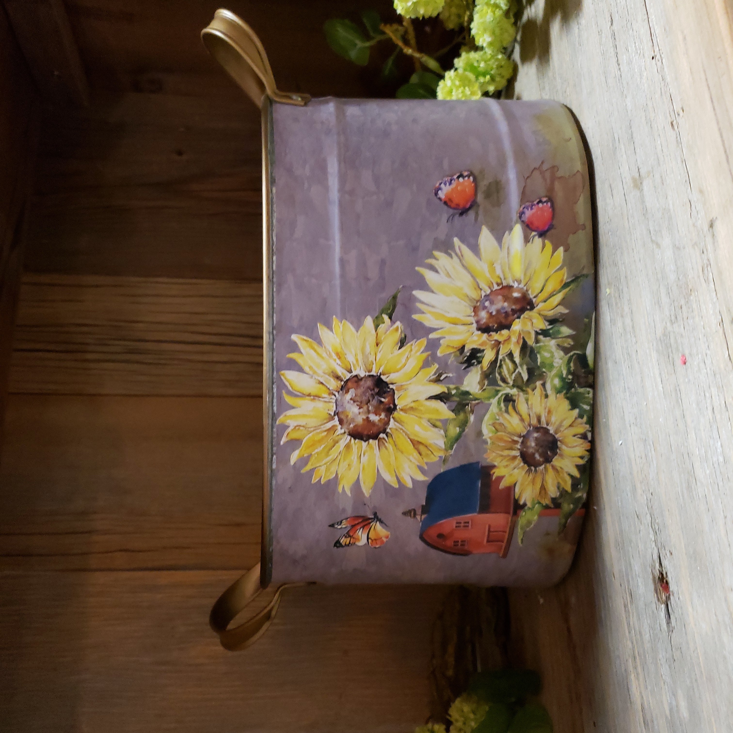 Sunflowers and butterflies oval tin