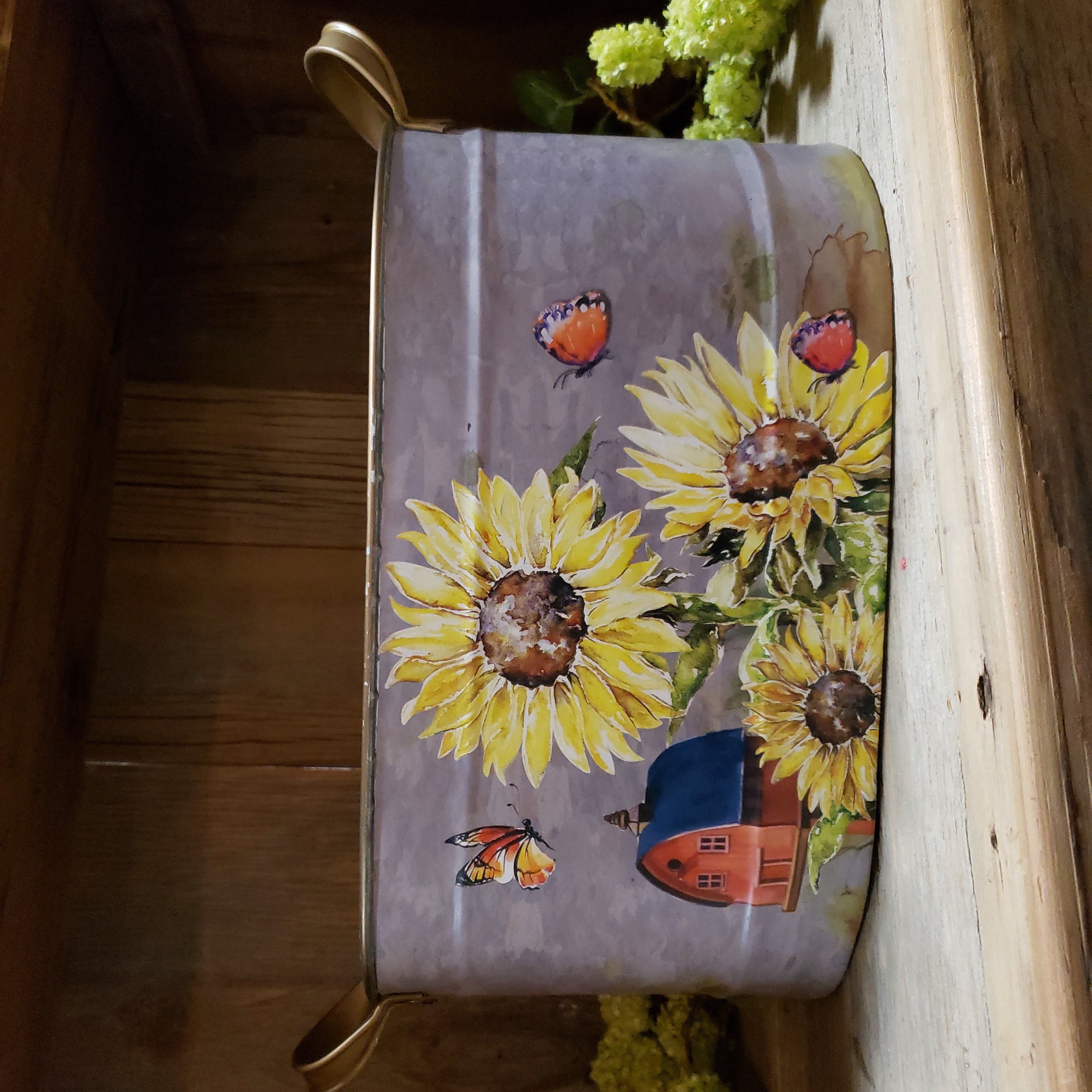 Sunflowers and butterflies oval tin