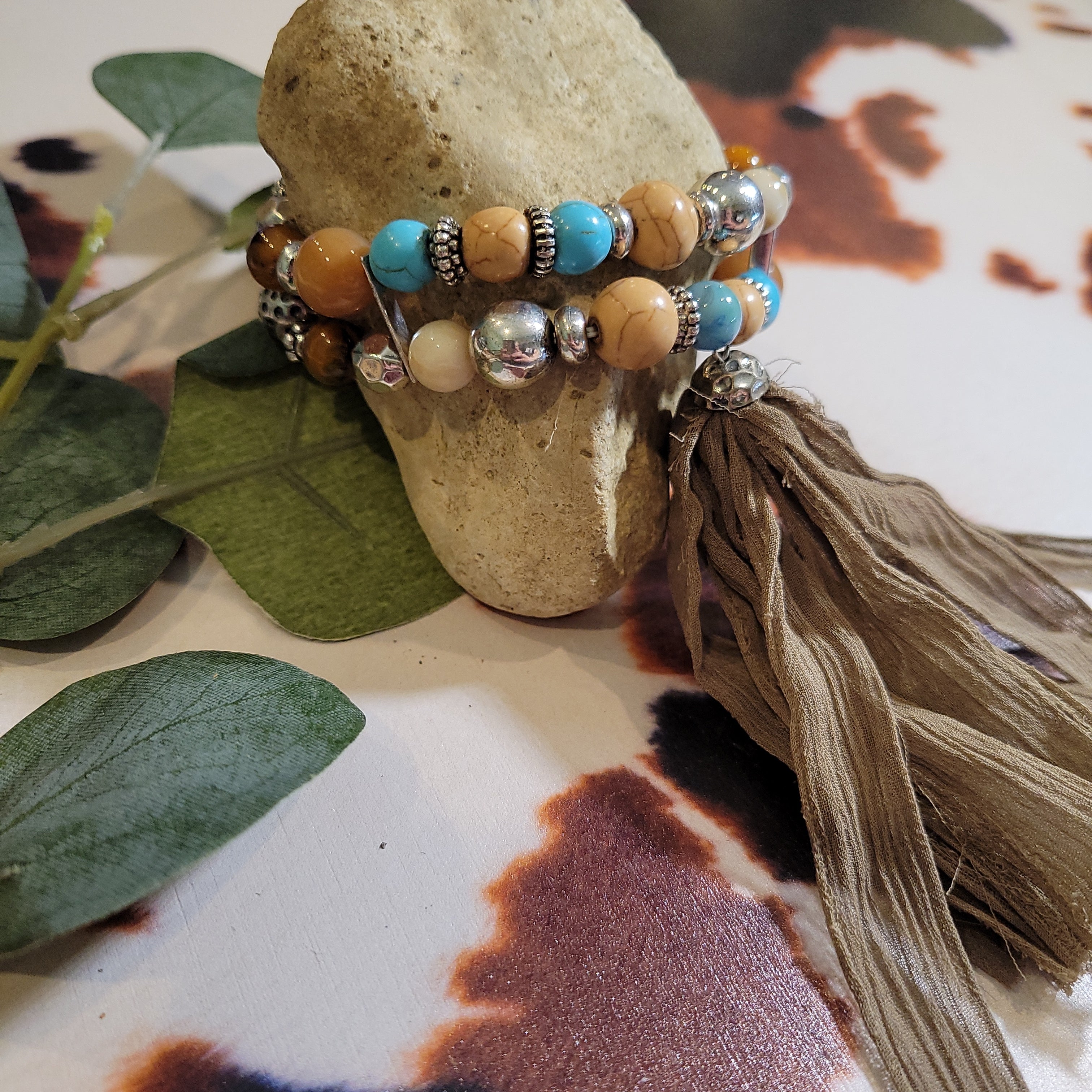 Multicolor beaded stretch bracelet with tassel