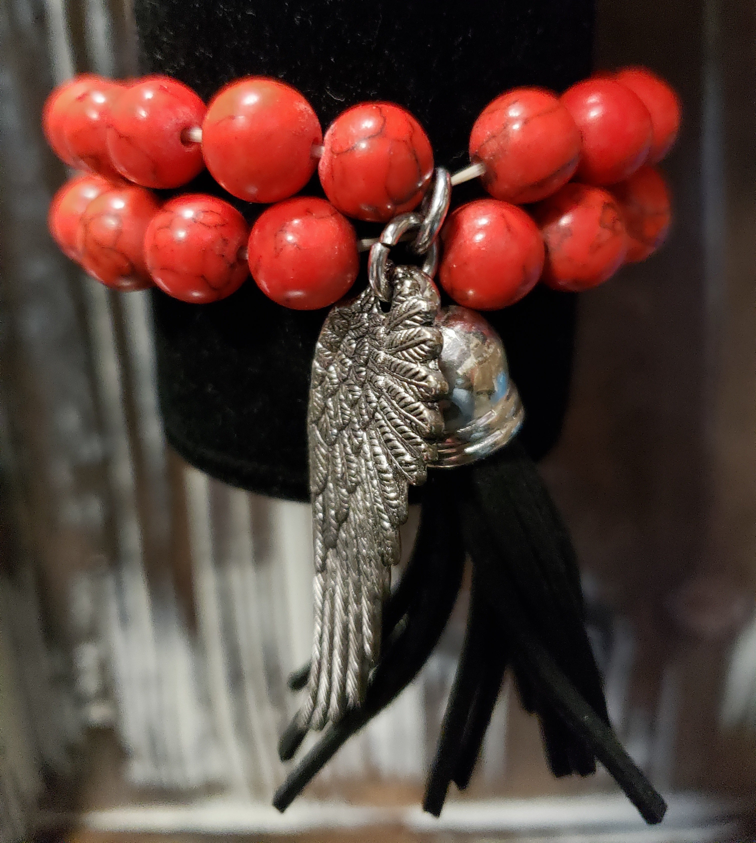 Red beaded angel wing and fringe bracelet