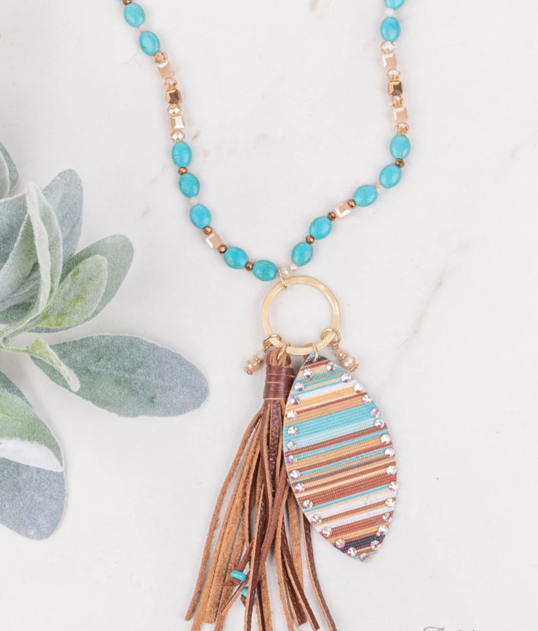 Westward boumd beaded necklace with serape pendant and leather tassel