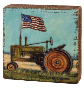 Tractor with flag block sign