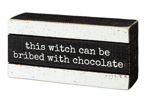 Witch bribed box sign