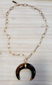 Gold chain and half cresent pendant necklace