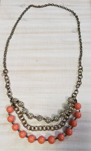 Peach and silver necklace