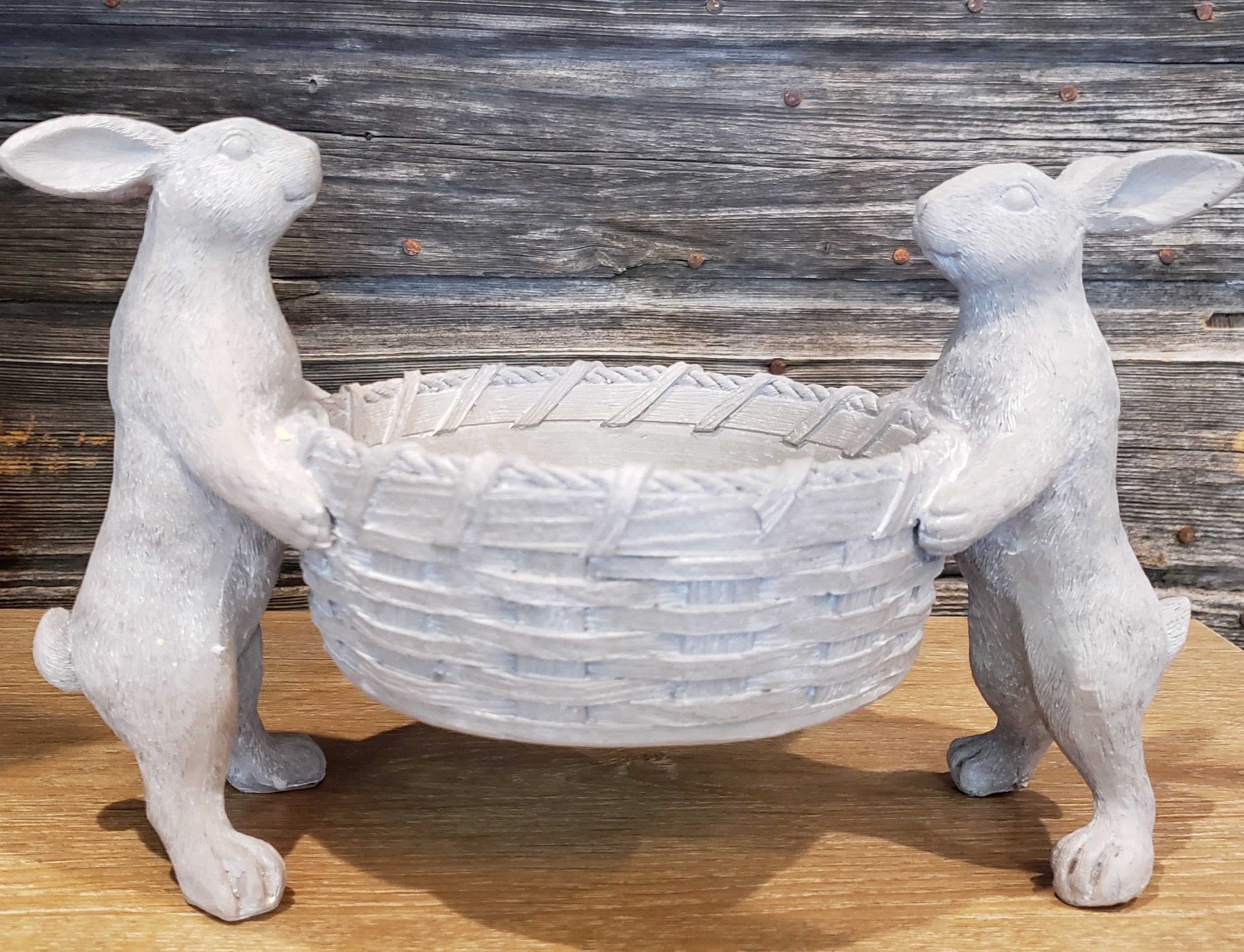 Bunnies holding a basket