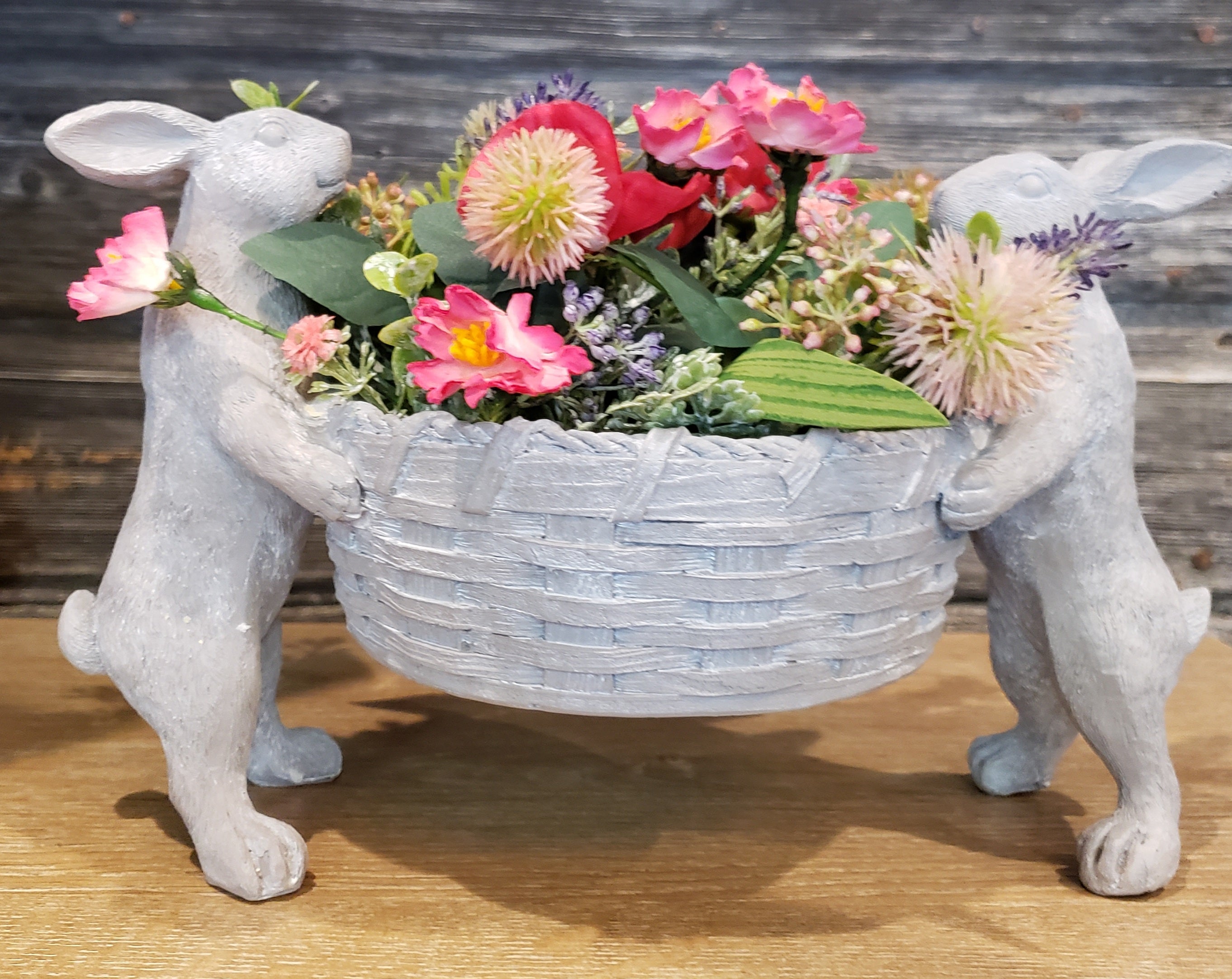 Bunnies holding a basket