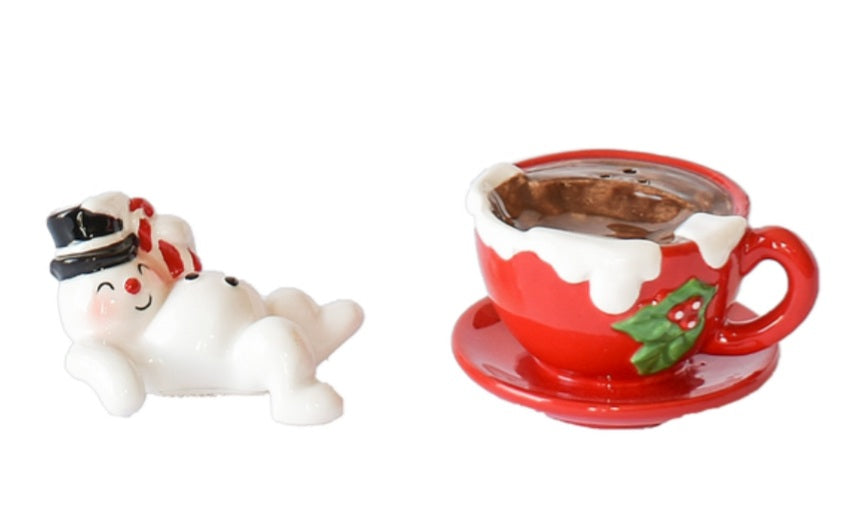 Snowman on a mug salt and pepper shakers set