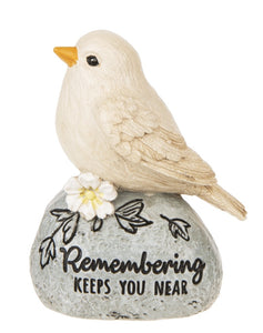 Memorial bird figurines