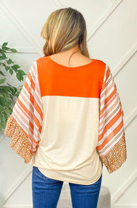 Orange stripe color block blouse