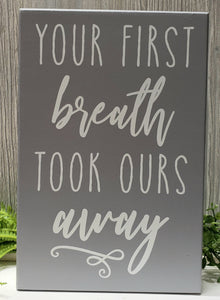 Your first breath took ours away box sign