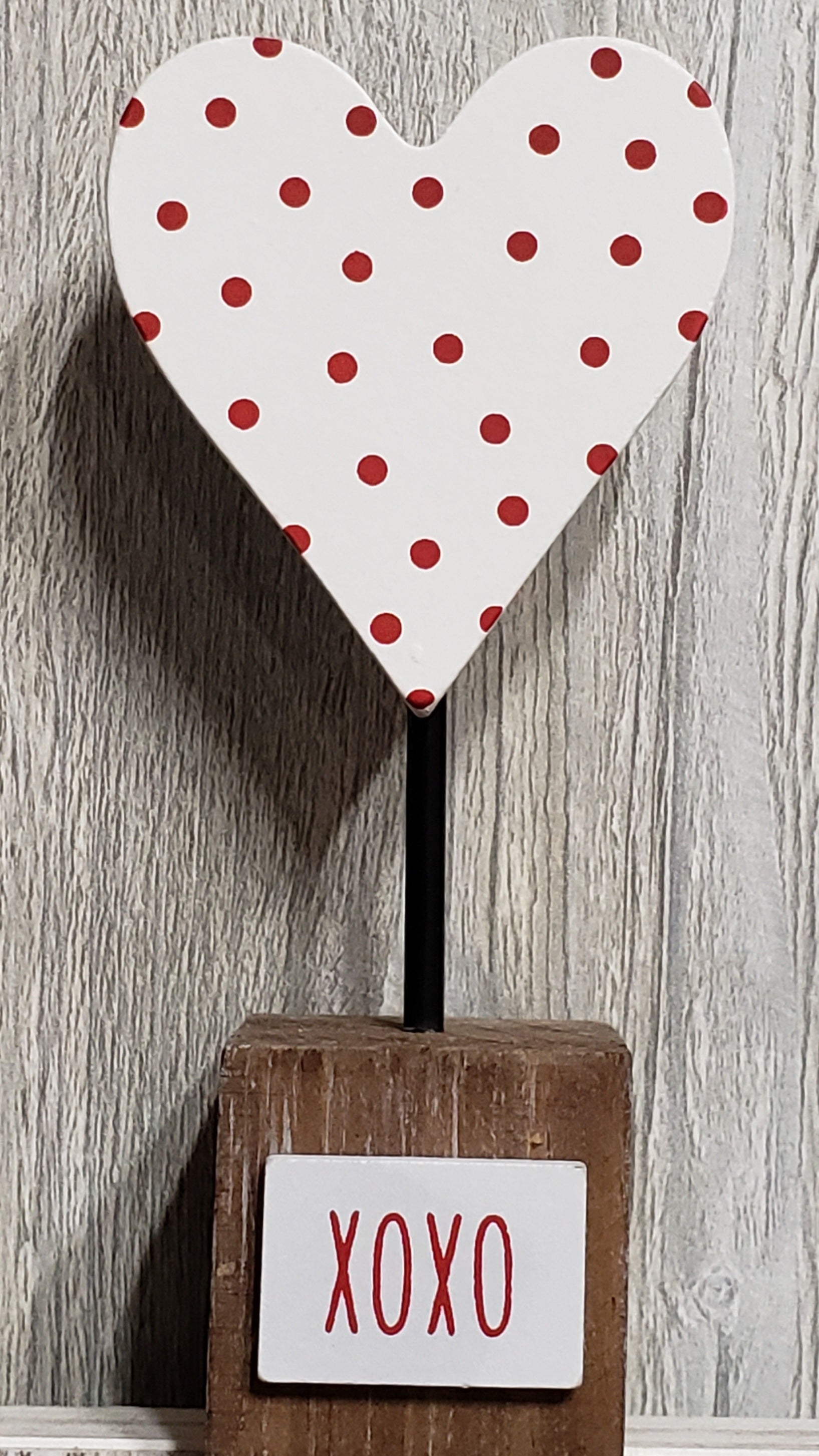 dotted heart on a base