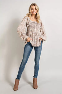 SMOCKED RUFFLE FRONT WOVEN TOP