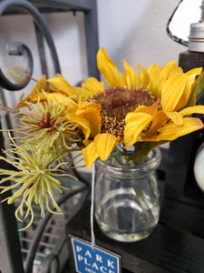 Sunflower in glass jar